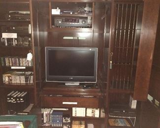Interior of entertainment center.  Tv has sold.