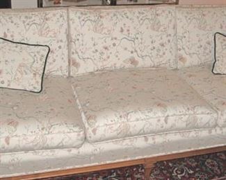 Cool sofa with butterfly upholstery.