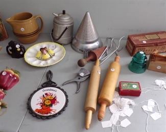 vintage wall kitchen Pieces, Rolling Pins, Coffee Pot, green insulator, Tins, and even price tags (not for sale) 
