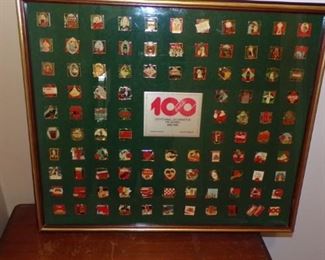The "Coke" 100 yrs. Anniversary  Poster. and Pins representing them.