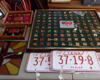 the 100 Anniversary of Coke's /Pins, License Plates, stained Glass Square, 2 other Coke Pins in case, and an Olympic Case with Pins