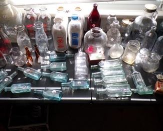 Great variety of Medicine, Milk, Blue Jars, misc. Jugs, and more