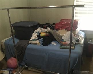 This bed and clothes rack are still available.