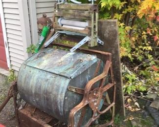 . . . I have seen bits and pieces of these, especially the wringer, but I have never seen an early washing machine in tact -- what a statement piece -- $50 buys this beauty!