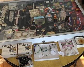 . . . we have a nice variety of jewelry available -- note the two hi-lo trucks still in original boxes.