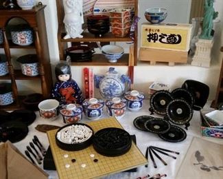 Wonderful  assortment of Japanese  entertaing dishware, ornate chopsticks and utensils, fans, dolls, vintage sushi maker on box, Japanese service garment, magnetic I GO game,  and more.
