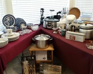 This is only a portion of all the kitchenware ... crock pot,  blender,stock pots, cuisinart, juicer, vintage Japanese steamer, Wilton cooling racks, blue willow dishes, vintage Japanese cake carrier. .  And Much more