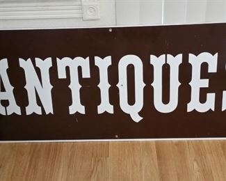 Metal 'ANTIQUE' sign