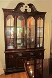 High quality, solid wood china cabinet, beveled glass, glass shelves, lighted, mirrored back