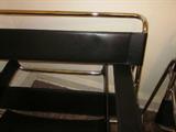 Pair of vintage black leather Wassily chairs, chrome frames ... maker unknown