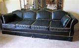 Vintage leatherette sofa, cream piping ... has wear.