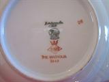 Hutschenreuther Gelb, Bavaria Germany, PASCO "The Magnolia" china. 12 7-piece place settings, plus serving pieces.