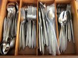 Ecko stainless flatware, "Eterna - Corsair," complete with iced tea spoons and cocktail forks.