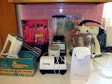Vintage Sunbeam Mixmaster, Osterizer blender, Universal hand mixer, Chef's Choice diamond hone knife sharpener, West Bend food processer, Salton coffee grinder, original Ronco Seal A Meal