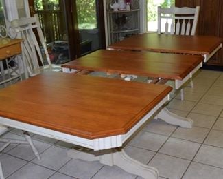 Dinette Table with 6 Distressed White Chairs. 42" W X 60" L Plus Two 1 Foot wide each Butterfly Leaves Built in. Expands to 84" L