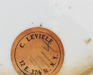Label on the pair of vases that have damage