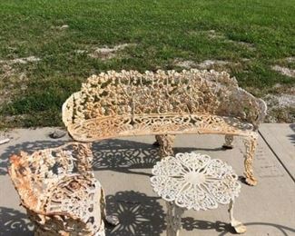 LRG CAST IRON BENCH $ 275.00 , CHAIR $ 90.00 AND TABLE $ 75.00 GRAPE PATTERN SALE PRICE $ 400.00