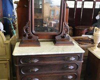 BLACK WALNUT VICTORIAN DRESSER, WITH MIRROR AND WHITE MARBLE TOP, HANKIE DRAWERS ON TOP AND 4 DRAWERS ON BOTTOM. $ 335.00
