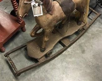 VINTAGE LRG. HORSE ROCKER, AND HAS WHEELS, IF YOU WANT TO USE AS A PUSH TOY. GREAT FOLK ART PIECE