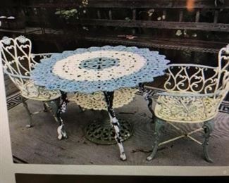 ANTIQUE HEAVY VICTORIAN CAST IRON TABLE, WITH ORIGINAL BABY BLUE PAINT. , COMES WITH 2 , SWEET FANCY FLORAL CHAIRS WITH MATCHING PAINT. RARE FIND