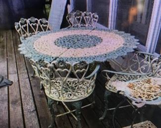 ANOTHER SET , HEAVY ANTIQUE VICTORIAN CAST IRON TABLE WITH ORIGINAL BABY BLUE PAINT, WITH 4, FANCY FLORAL CHAIRS IN THE SAME MATCHING PAINT.