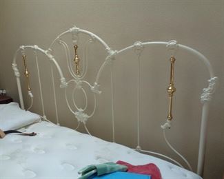 king bed w/ brass & white metal headboard, nice mattress
