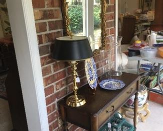 Foyer table with décor, wall mirror 