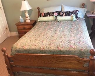 Oak full size bed with matching bedside table