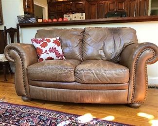 Brown leather loveseat...