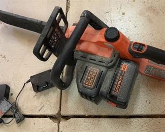 Black & Decker battery operated saw with charger