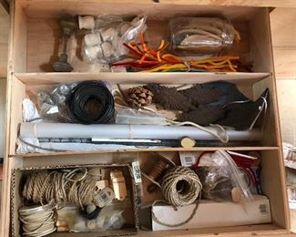 Woodworking and craft assortment: knobs, twine, book of craft ideas/patterns...