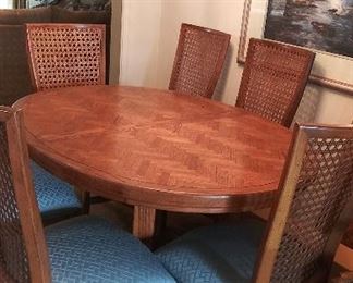 Solid wood dining table with 6 chairs, two leaves and pads