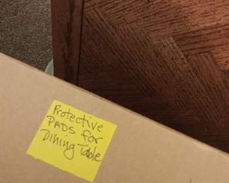 Solid wood dining table with 6 chairs, two leaves and pads