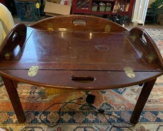 antique table with flip down sides.
