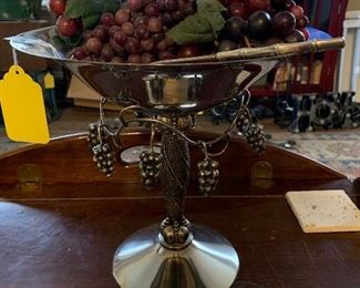 Silver stand with fruit. 
