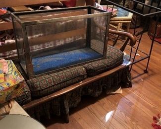 nice fish bowl and the fish bowl stand is to the right