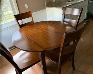 Drop-leaf kitchen table and four chairs
