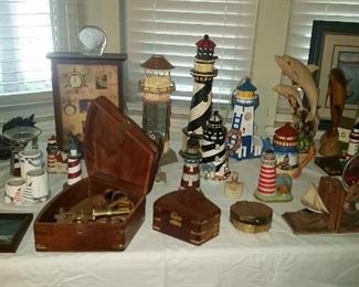 Nautical lighhouses, sextants, pictures, figurines, collectables.