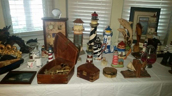 Nautical lighhouses, sextants, pictures, figurines, collectables.