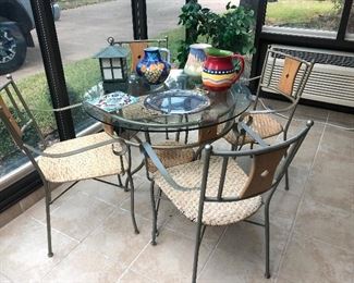 Round glass top table and 4 chairs