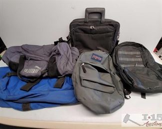 Five Various Sized Bags
One Dell Computer case bag, Two Sports duffel bags(one PUMA brand), one Jansport Grey and one targus backpack