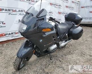 65: 	
2000 BMW R1100RT, Black
Bike has front adjustable windshield, hand controls for radio, removable saddle bags and back storage bin. Year: 2000
Make: BMW
Model: R1100RT
Vehicle Type: Motorcycle
Mileage: 39537
Plate: 15P9107
Body Type:
Trim Level:
Drive Line:
Engine Type: 2cyl, 66.2CID; 4-Stroke
Fuel Type: Gasoline
Horsepower: 90HP
Transmission:
VIN #: WB10418A1YZC67694

DMV fees $15 and $70 doc fees 