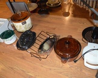 Crock pots, roaster, turkey stand, small grill