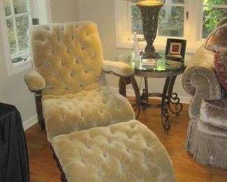 Armchair with foot stool.