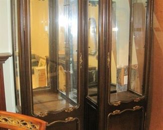 A pair of Display/Curio Cabinets with mirrored backs and lights.