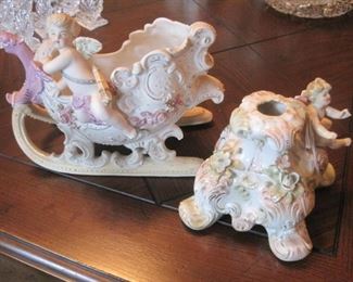 Cupid with Dragon Sleigh. Candlestick.