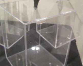 Lockable display cases with finials.