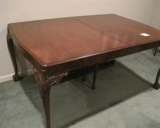 Dining Table with 2 extra leaves.