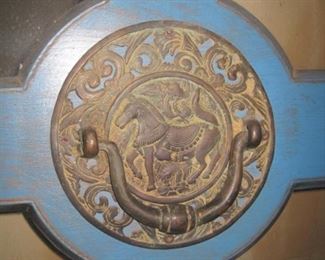 Quality door with glass panels and ornate knocker.