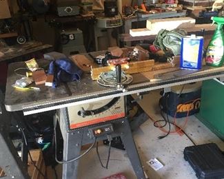 Craftsman 10” table saw.  Cast iron top and wings